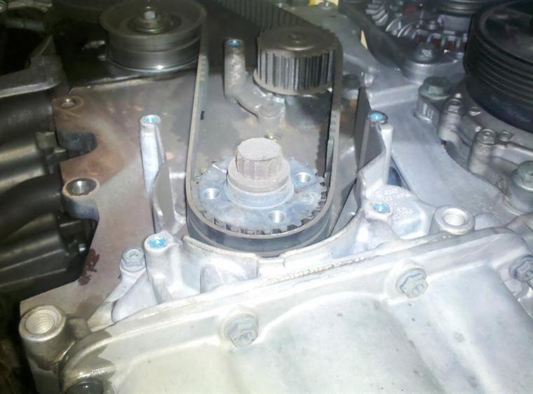Another view of the stripped belt that let the valves meet the pistons.