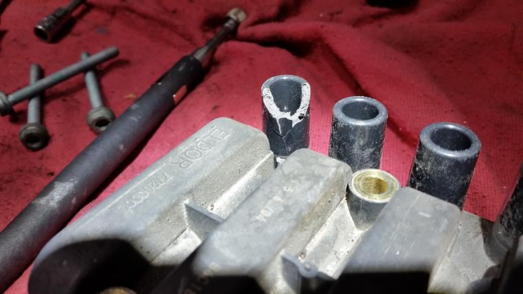 Removed for inspection. A spark plug wire was hiding a chipped wire nipple.
