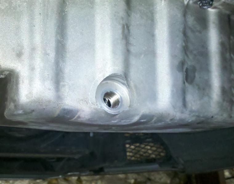 Helicoil insert drawn into place.